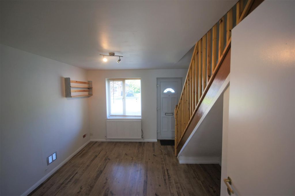 Property photo 2 of 11 Front-Room.Jpg