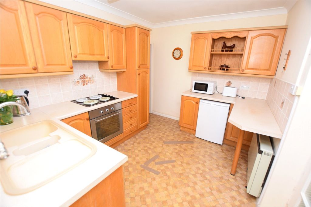 Property photo 2 of 12 Kitchen