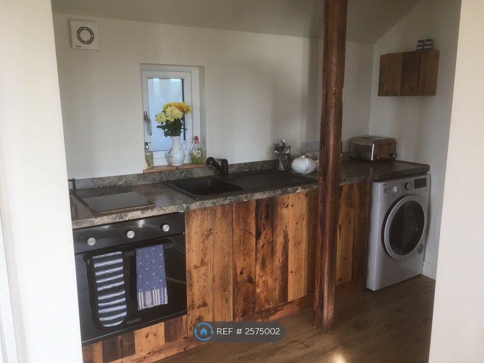 Property photo 3 of 4 Kitchen Area