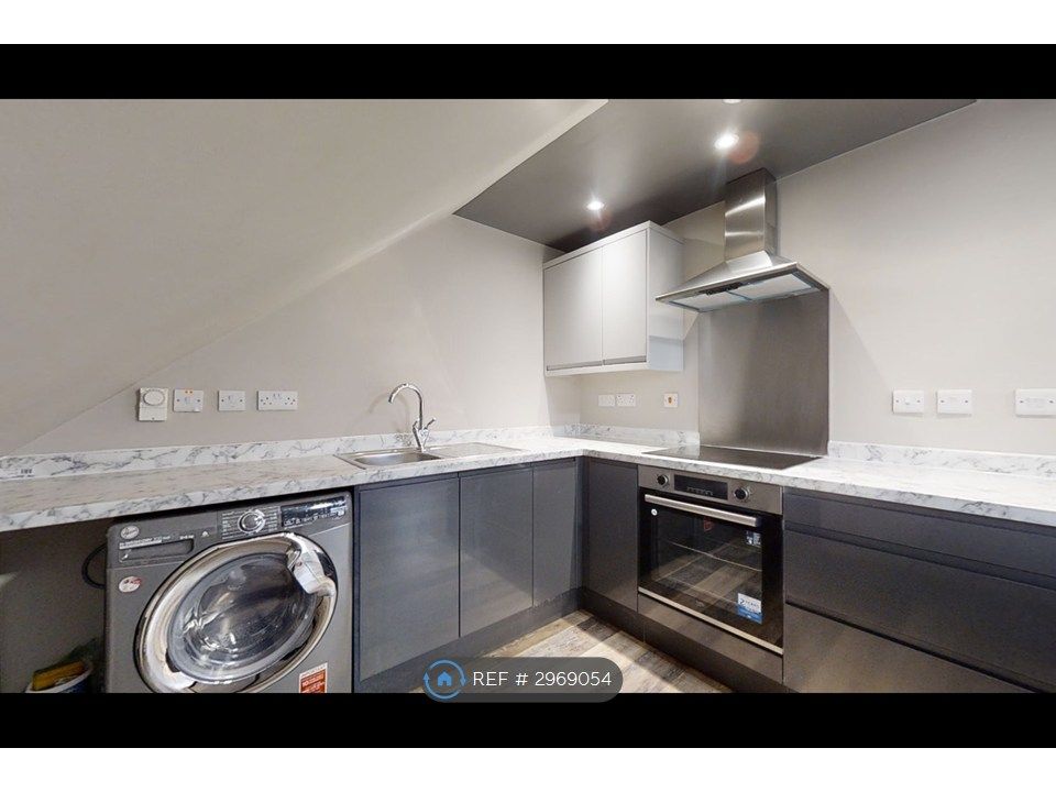 Property photo 3 of 7 Modern Kitchen With Induction Hob And Oven