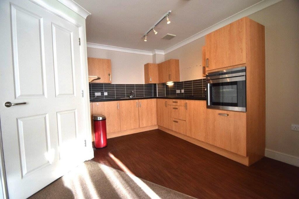 Property photo 3 of 12 Kitchen
