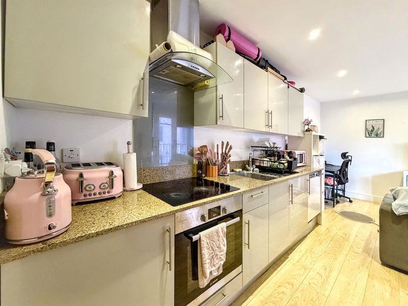 Property photo 3 of 8 Kitchen Area