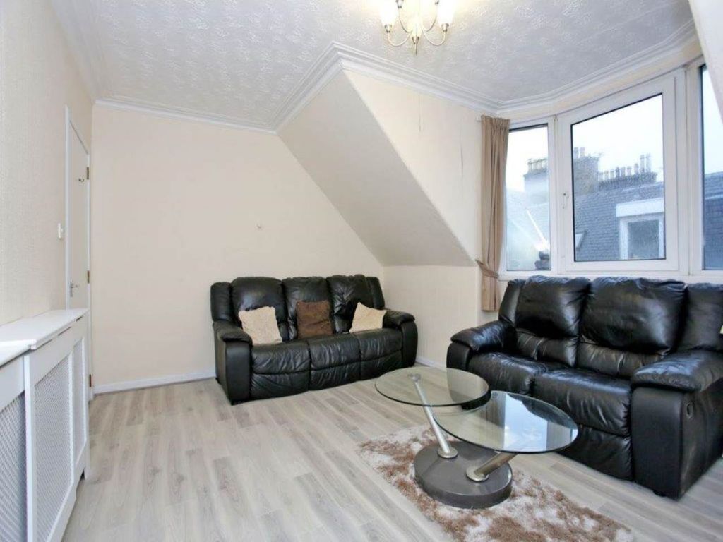 Property photo 2 of 12 Living
