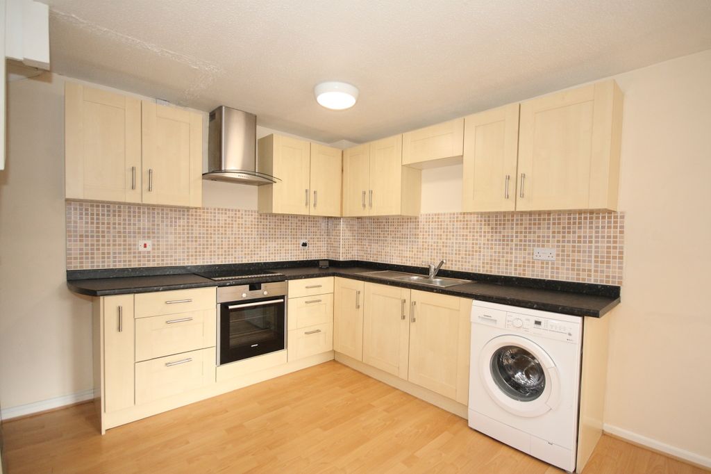 Property photo 3 of 5 Kitchen Area