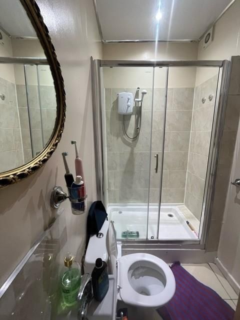 Property photo 3 of 7 A Clean And Well-Maintained Bathroom Featuring A S...