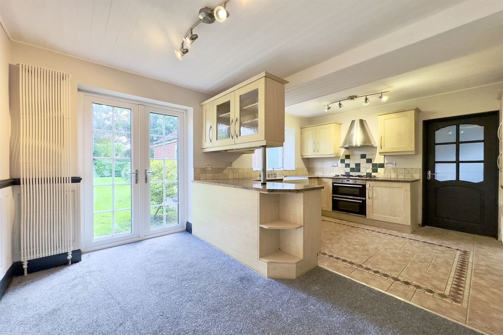 Property photo 3 of 17 Dining Kitchen