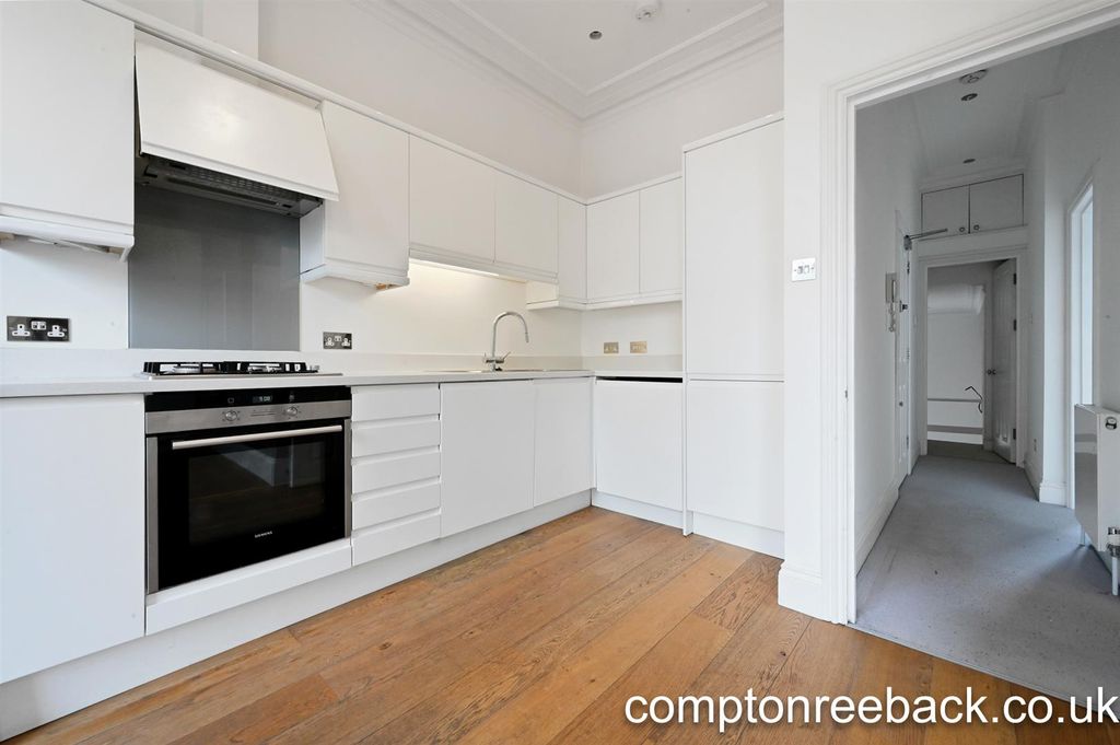 Property photo 3 of 7 Kitchen