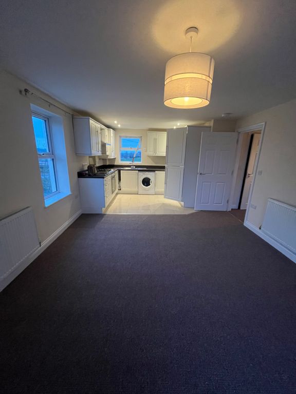 Property photo 3 of 9 Kitchen Area