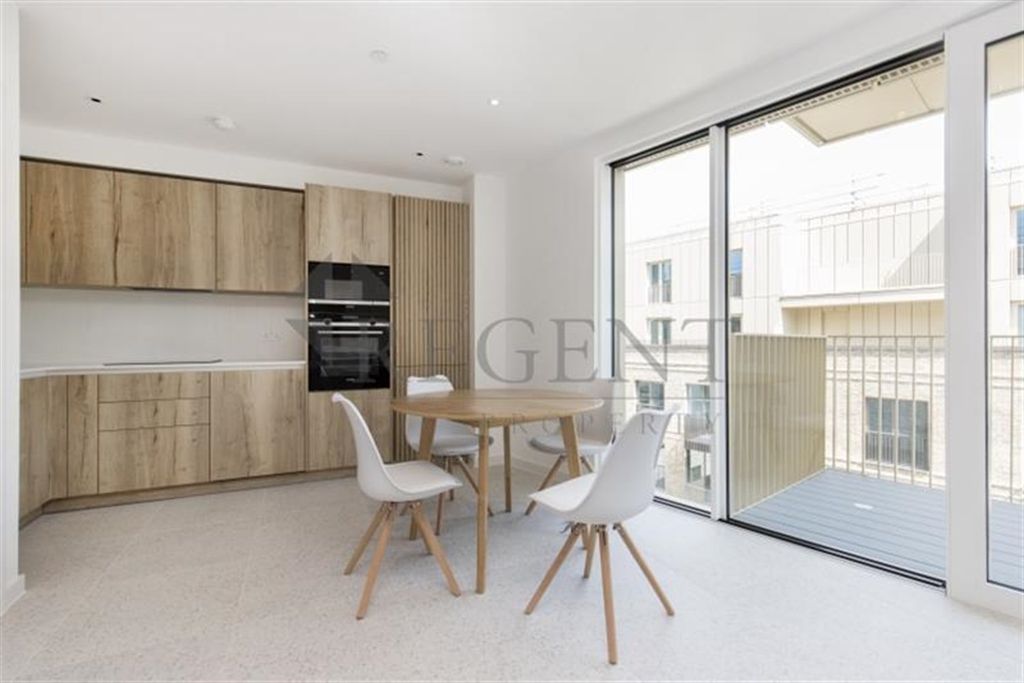 Property photo 3 of 7 Dining Room To Kitchen View