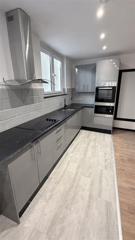 Property photo 2 of 8 Kitchen