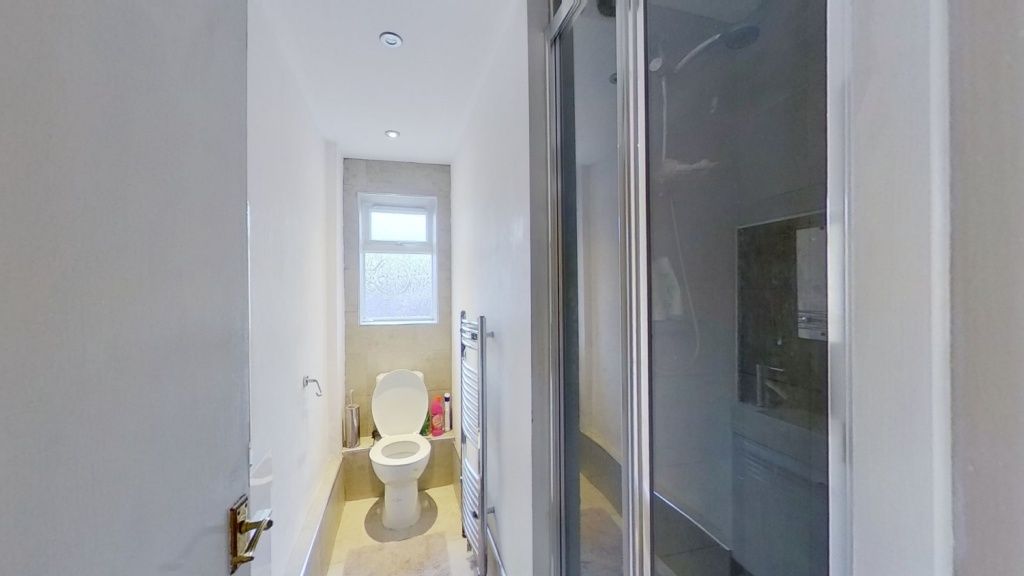 Property photo 3 of 11 A Clean And Well-Maintained Narrow Toilet Room Wit...