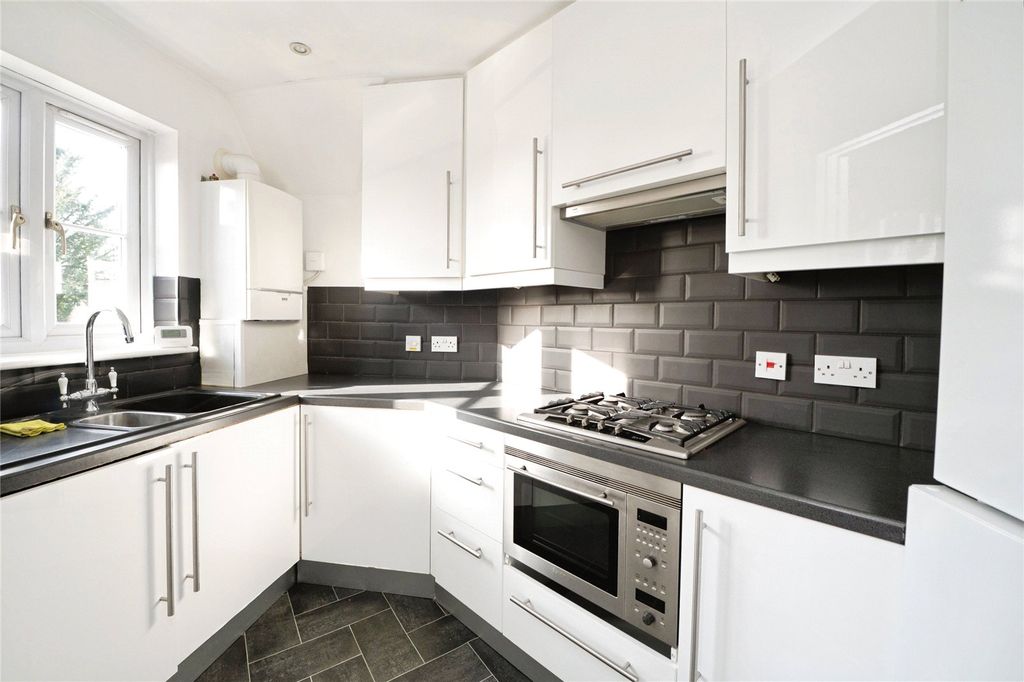 Property photo 3 of 12 Kitchen