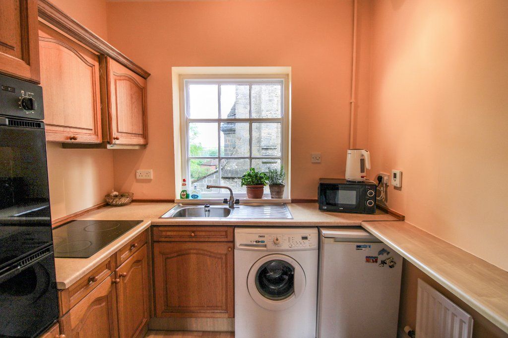 Property photo 3 of 13 Kitchen