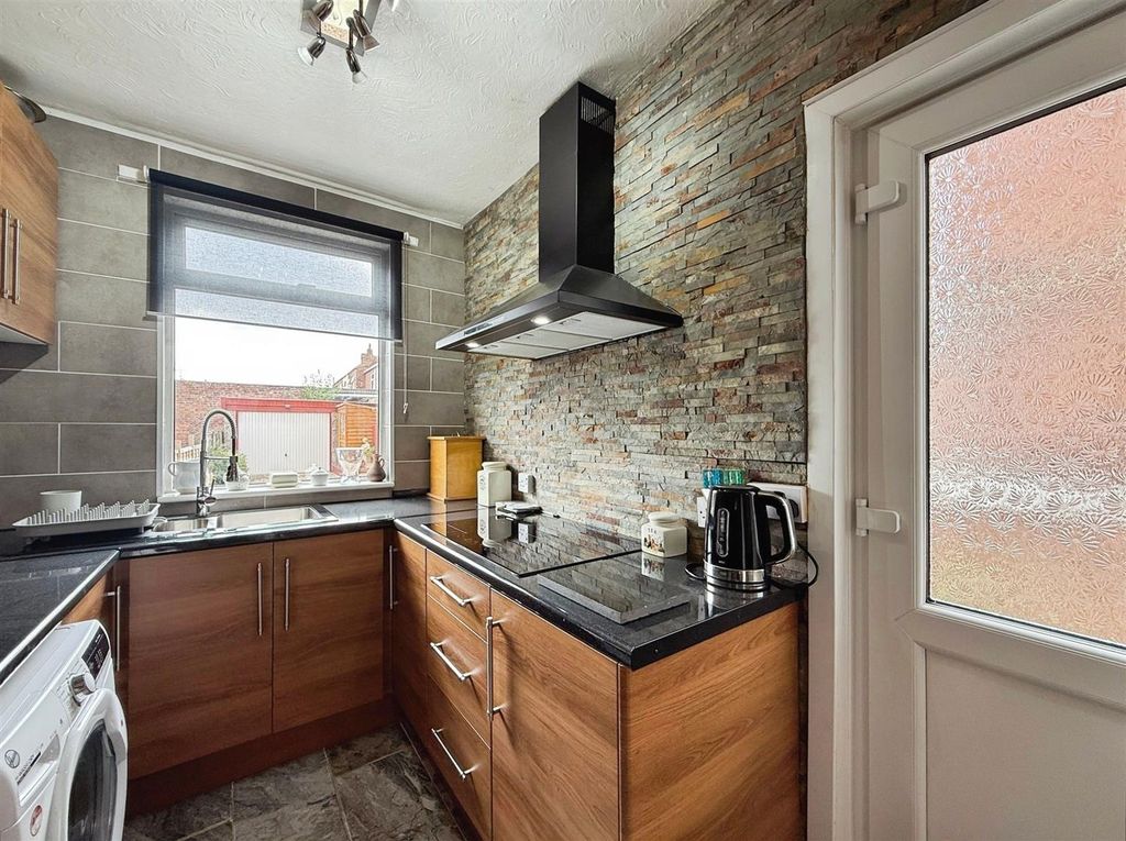 Property photo 3 of 16 Kitchen