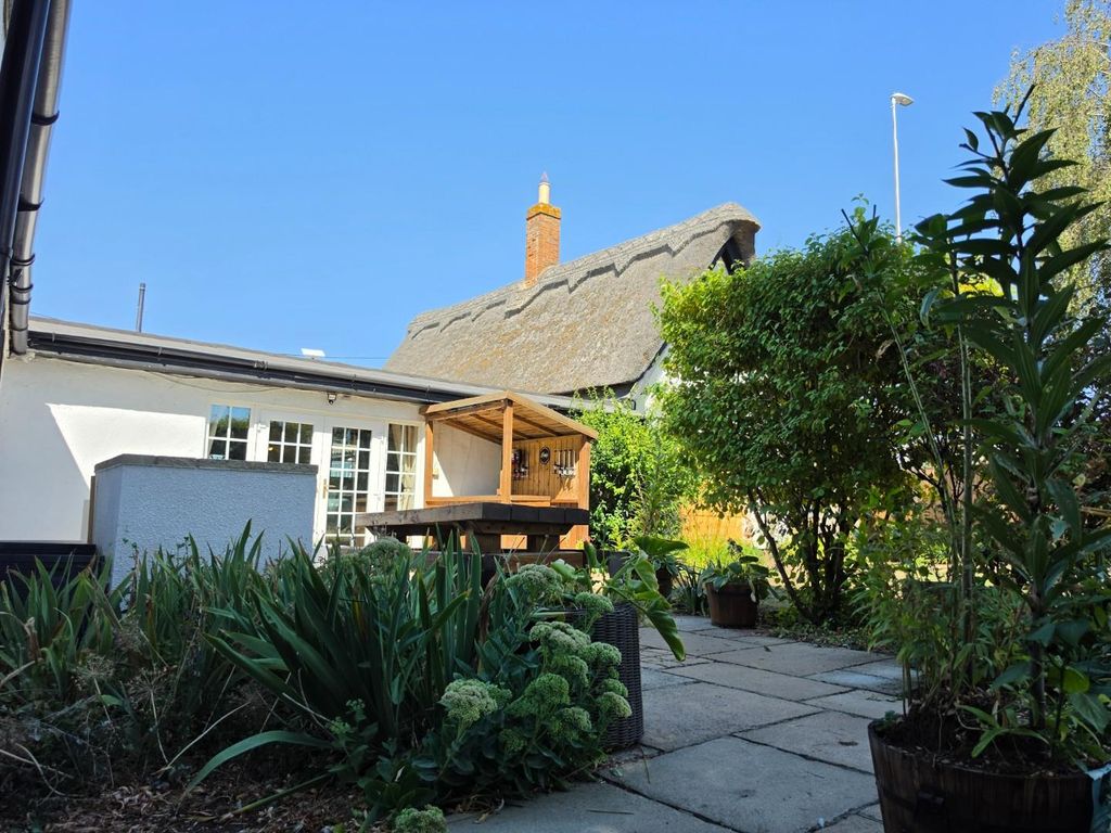 Property photo 2 of 29 Thatch Cottage Summer Patio.Jpg