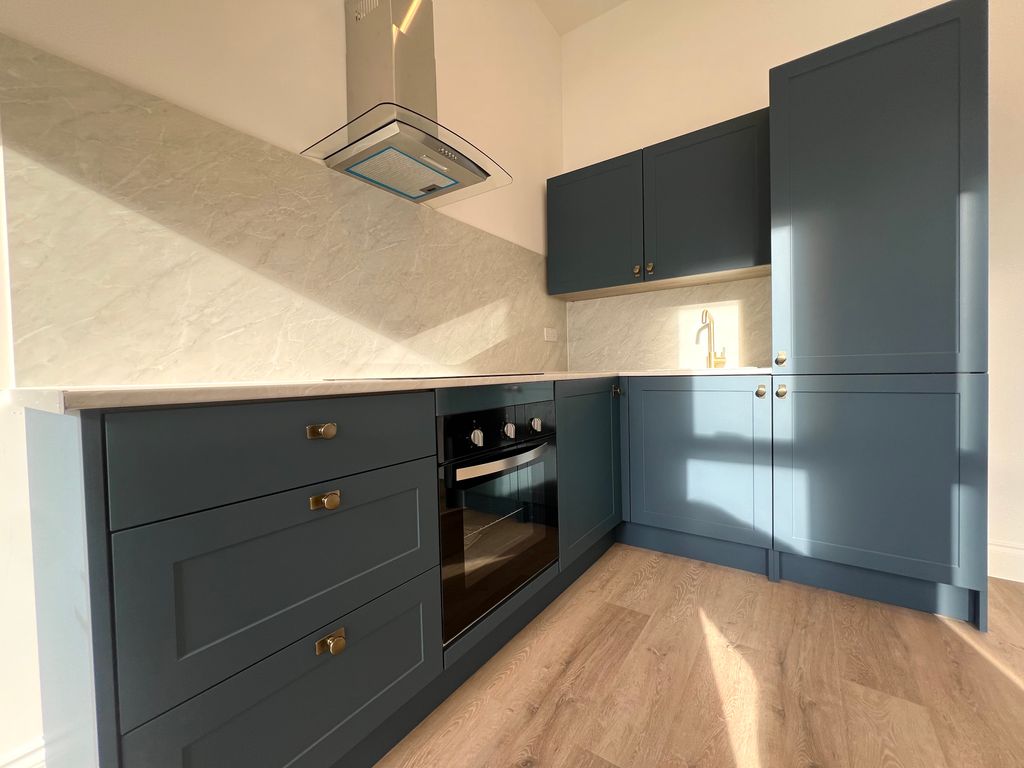 Property photo 3 of 7 Kitchen