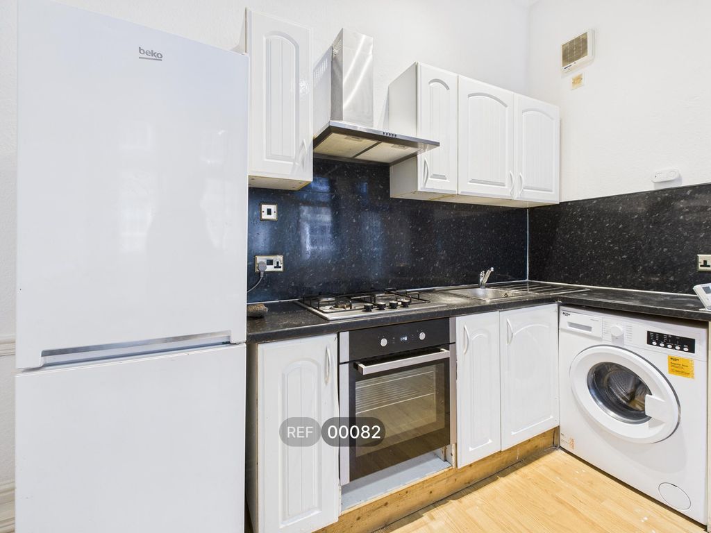 Property photo 1 of 19 Kitchen & Living Area