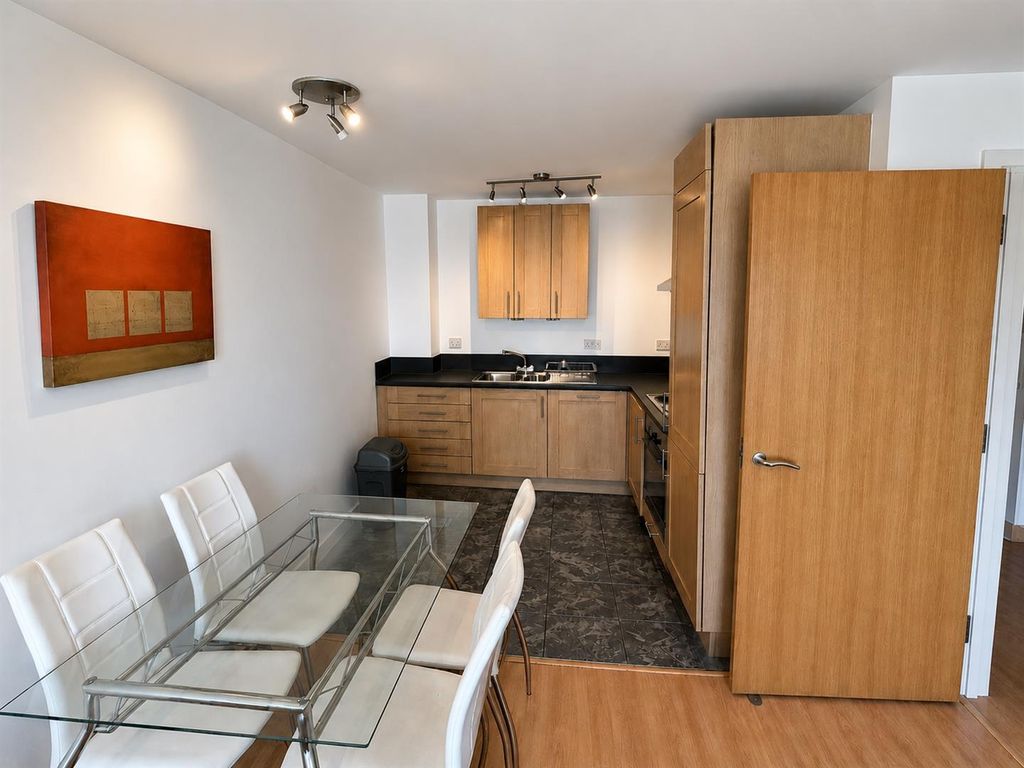 Property photo 2 of 6 Modern Open Plan Kitchen With Stylish Dining Set...