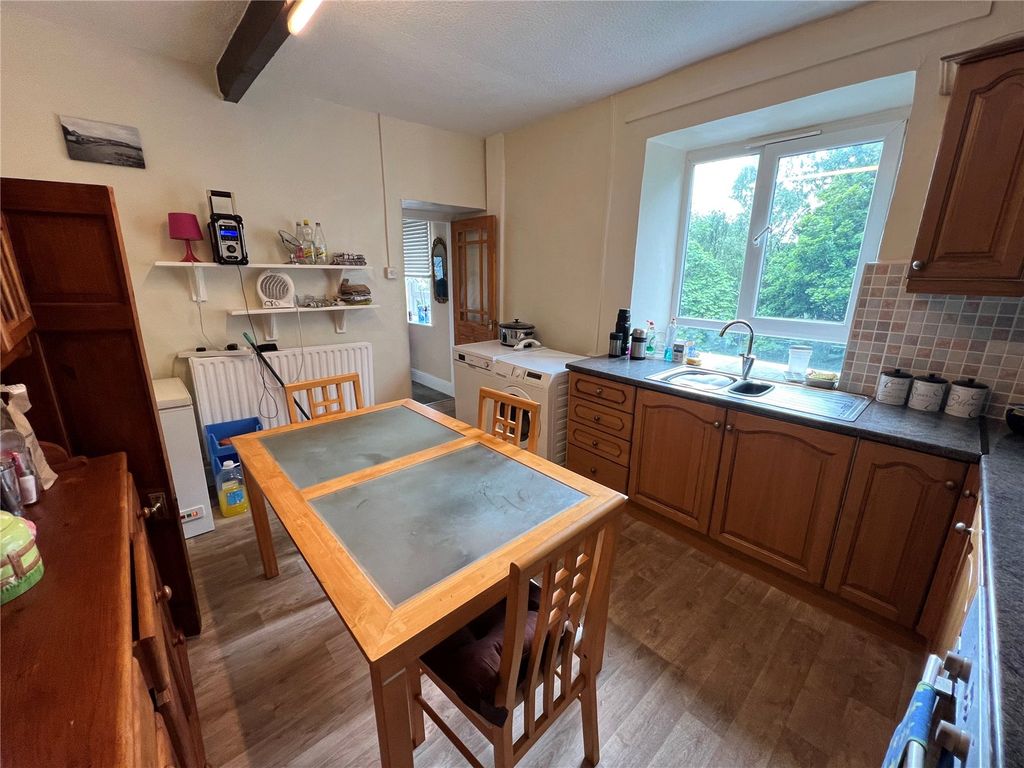 Property photo 2 of 19 Kitchen One