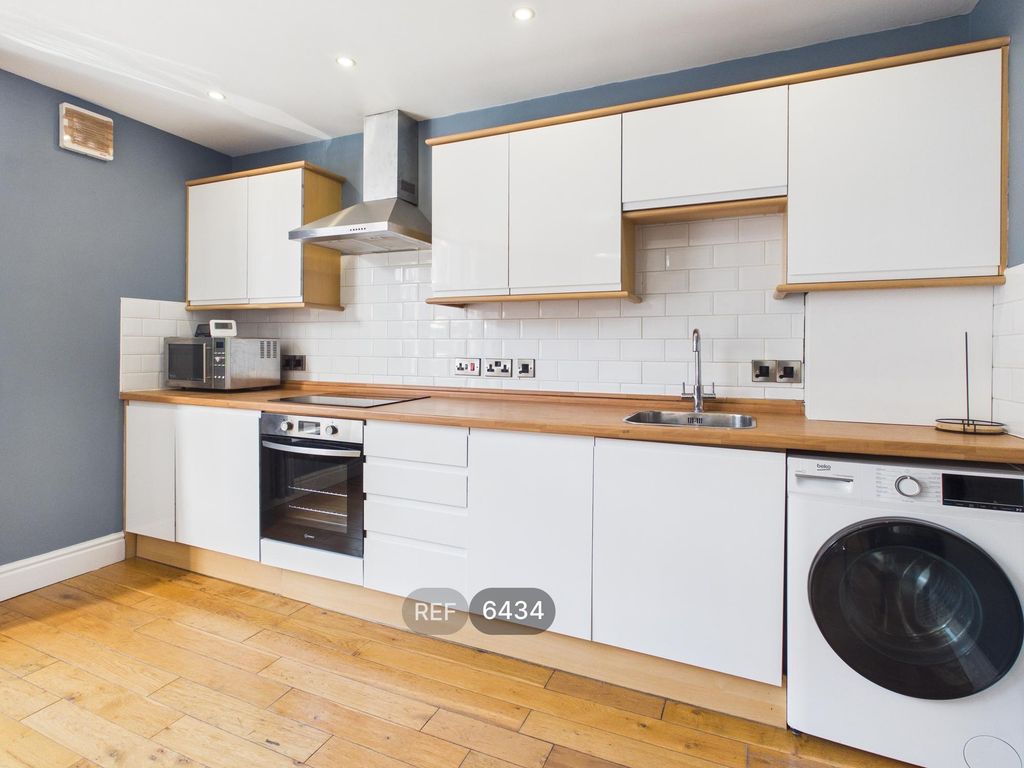 Property photo 2 of 14 Kitchen & Living Area