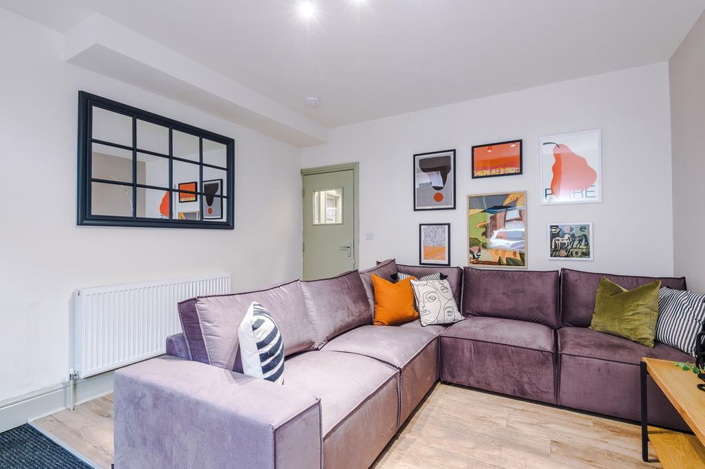 Property photo 1 of 6 Modern Living Area With A Plush Corner Sofa...