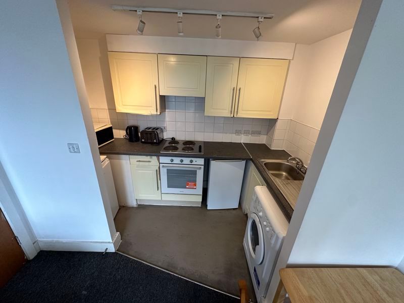 Property photo 3 of 8 Kitchen