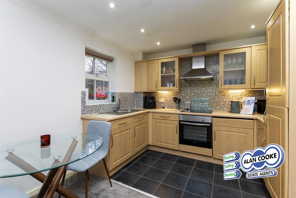 Property photo 2 of 10 Kitchen Area