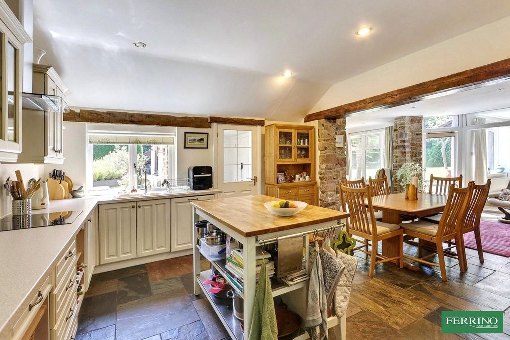 Property photo 3 of 32 Kitchen-Dining Area
