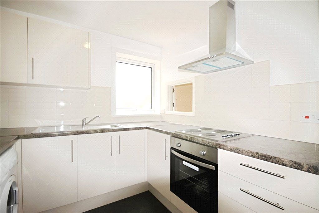 Property photo 3 of 8 Kitchen