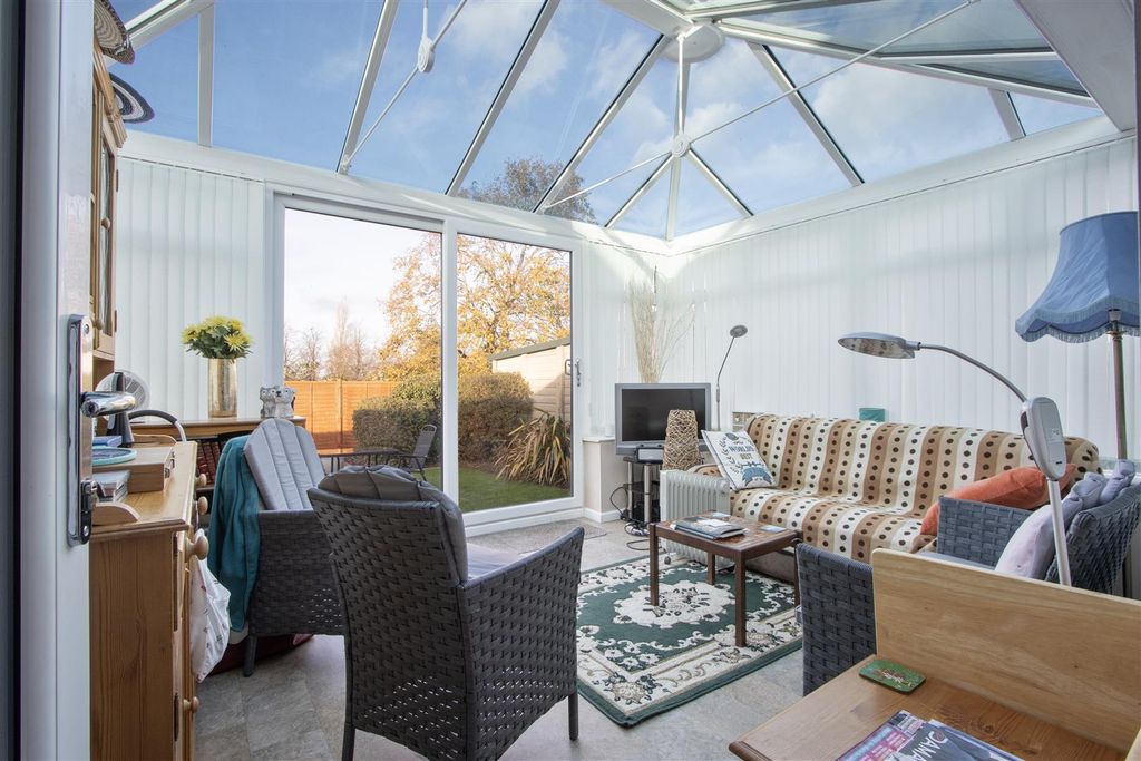 Property photo 3 of 12 Conservatory
