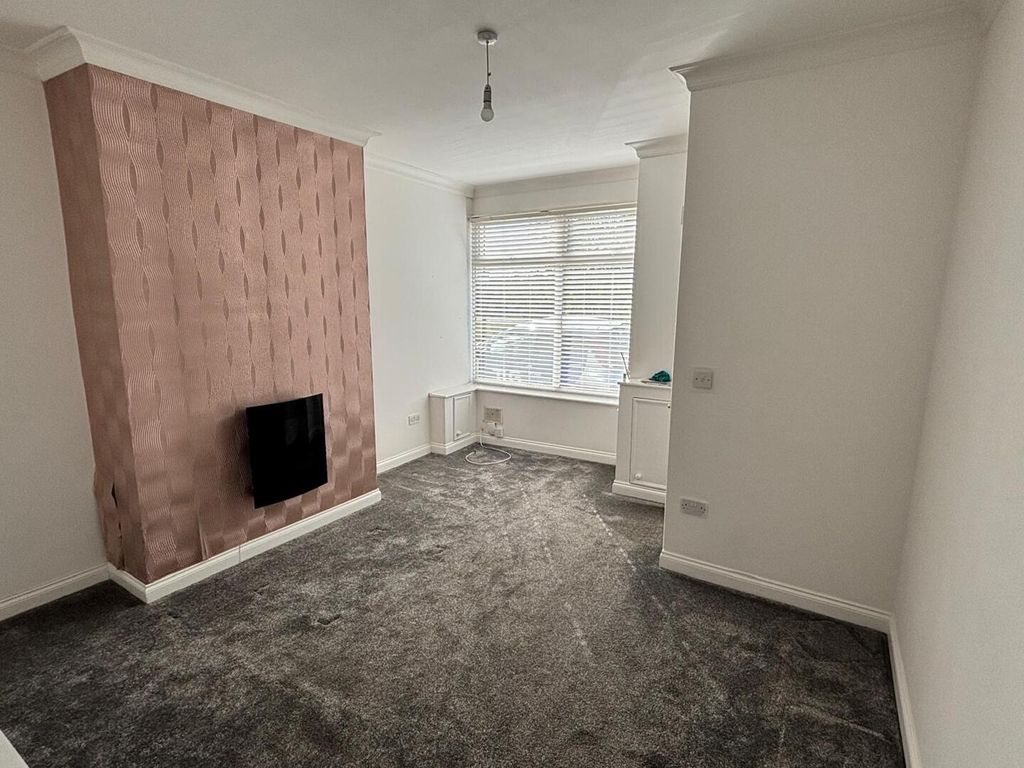 Property photo 2 of 12 Living Room