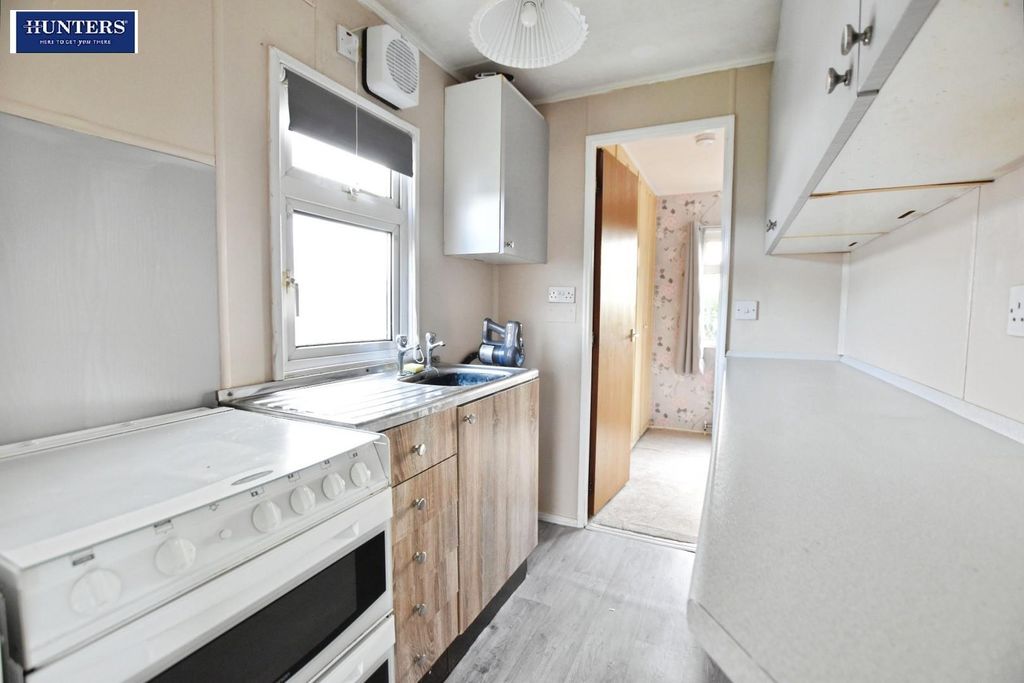 Property photo 2 of 11 Kitchen