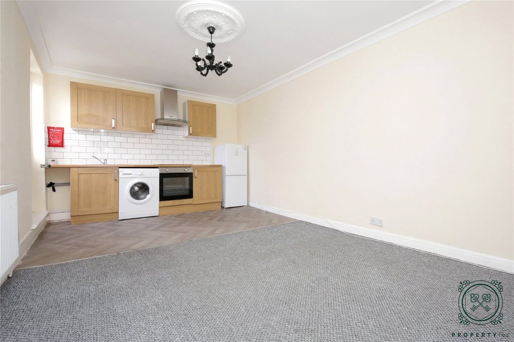 Property photo 1 of 8 Kitchen