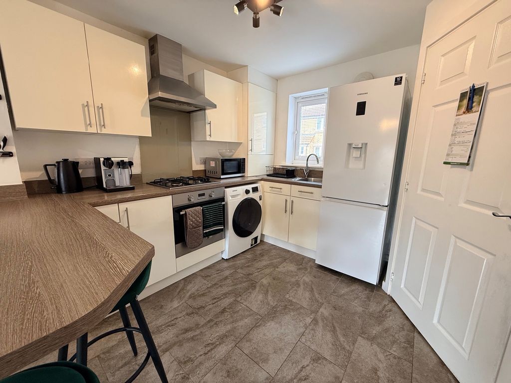 Property photo 2 of 16 Kitchen Area