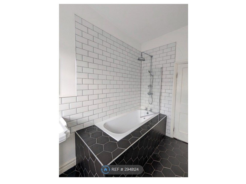 Property photo 3 of 8 Black &amp; White Chic Bathroom