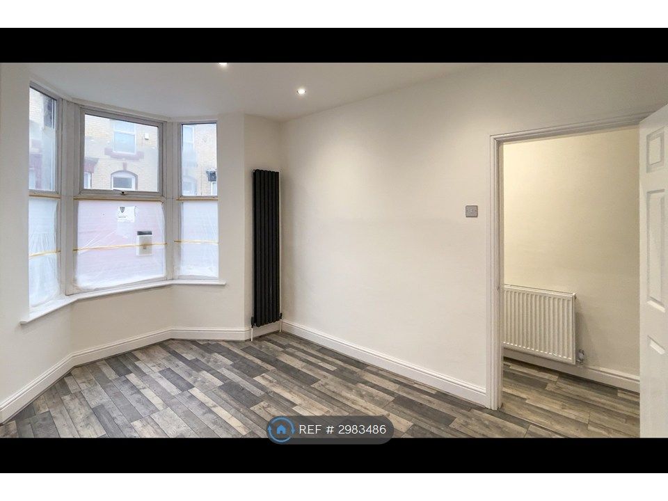 Property photo 3 of 21 Living Room With Modern Upright Radiator.