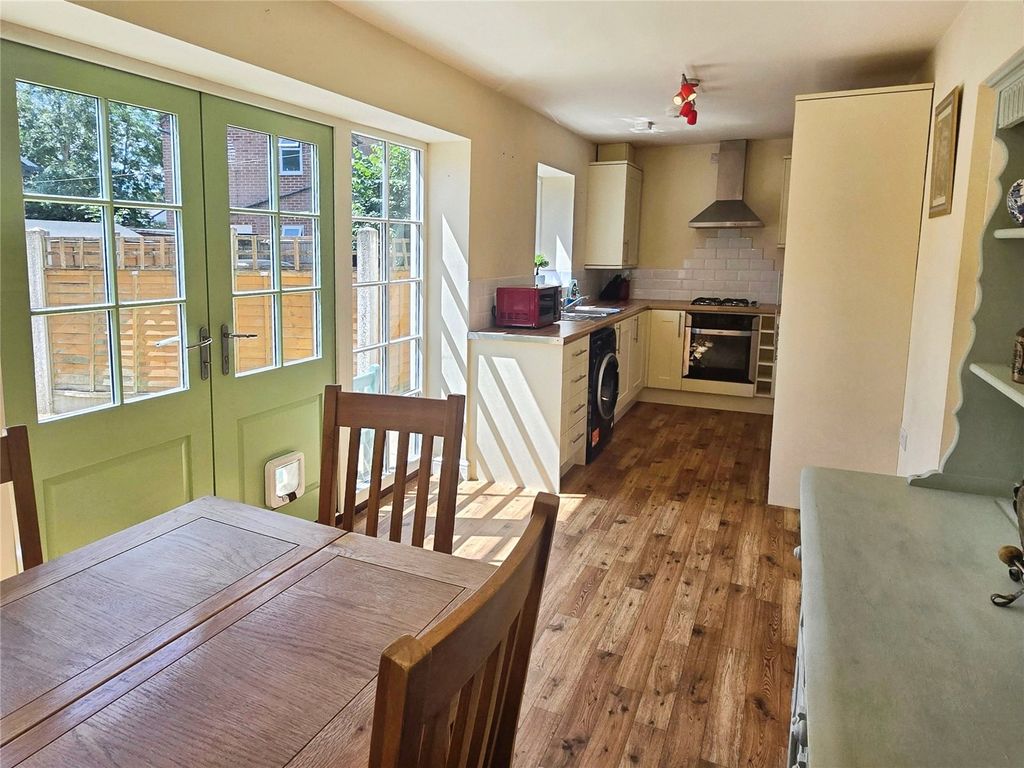 Property photo 3 of 17 Dining Kitchen