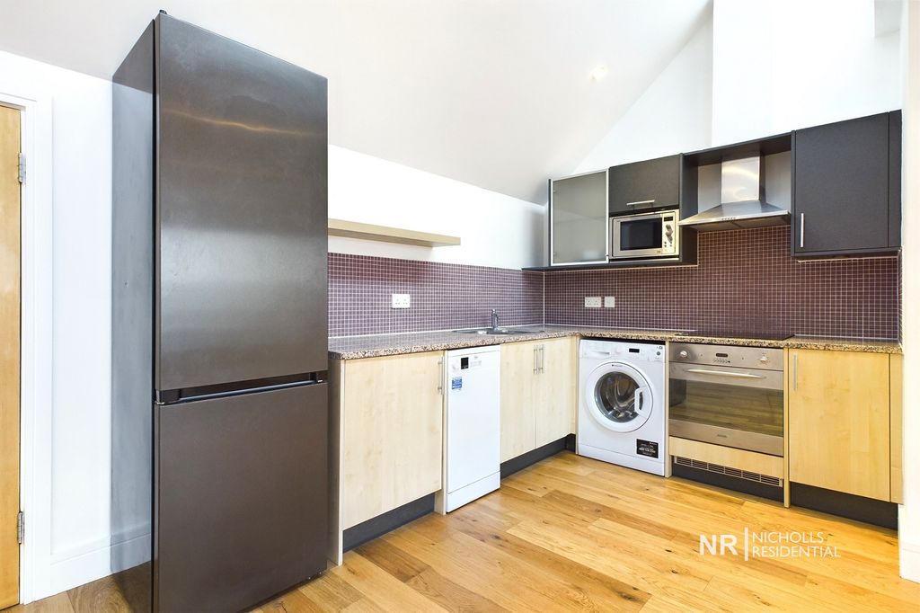 Property photo 3 of 13 Kitchen Area