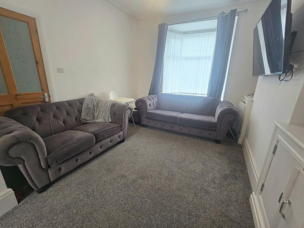 Property photo 2 of 9 Living
