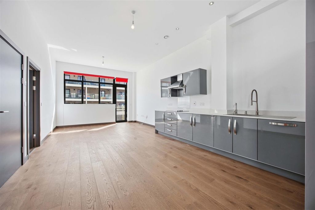 Property photo 2 of 22 Kitchen Area
