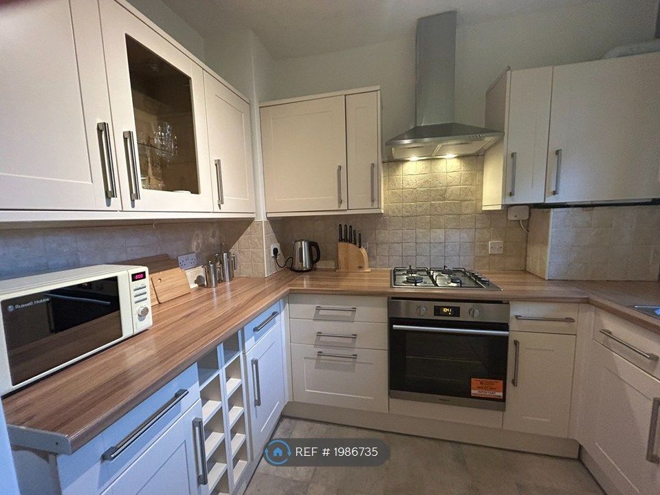 Property photo 1 of 8 Kitchen