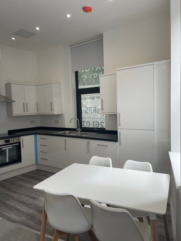 Property photo 3 of 7 Kitchen-Dining