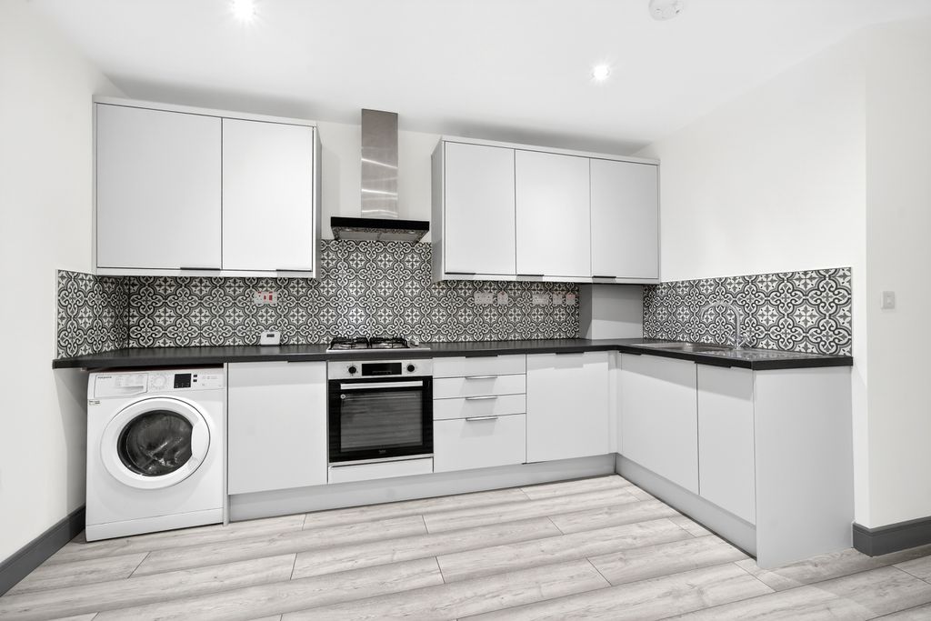 Property photo 3 of 12 Open-Plan Kitchen