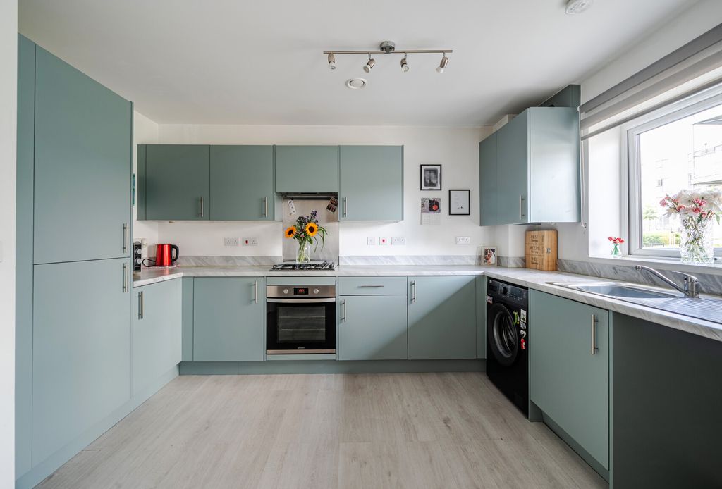 Property photo 3 of 13 Kitchen