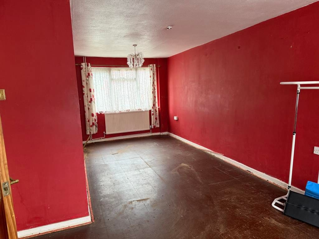 Property photo 2 of 10 Living Room In House In Need Of Improvement