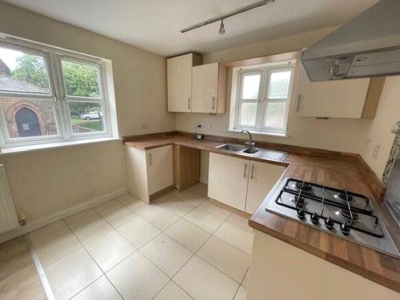 Property photo 3 of 8 Kitchen Area