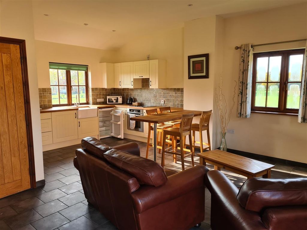 Property photo 2 of 8 Kitchen/Living Area