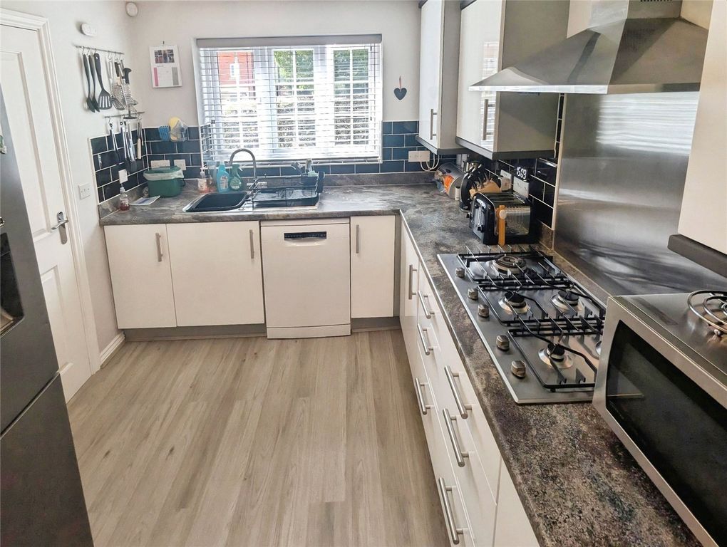 Property photo 3 of 13 Kitchen