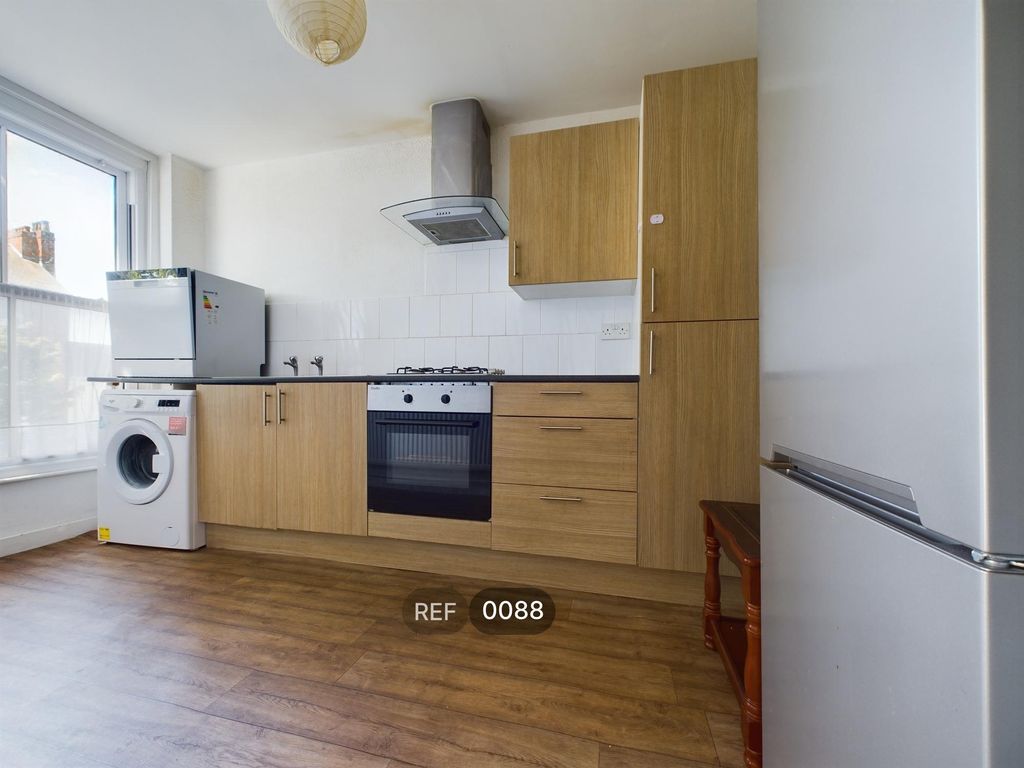 Property photo 3 of 8 Kitchen