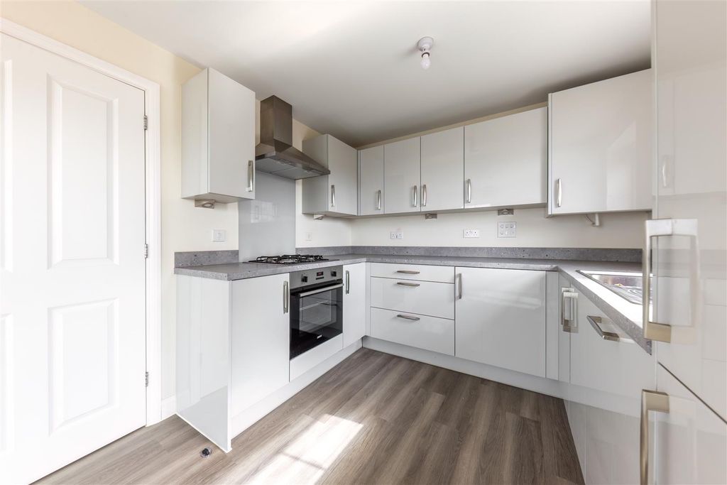 Property photo 3 of 13 Kitchen Area